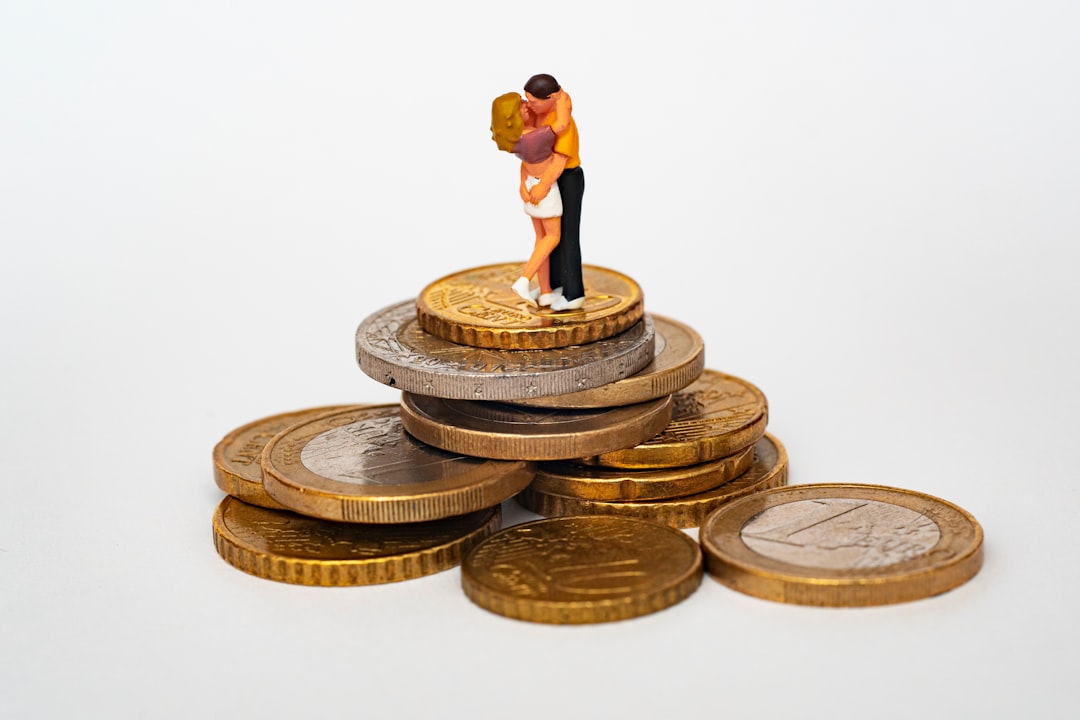 Married couple reviewing tax documents and calculator for capital gains filing