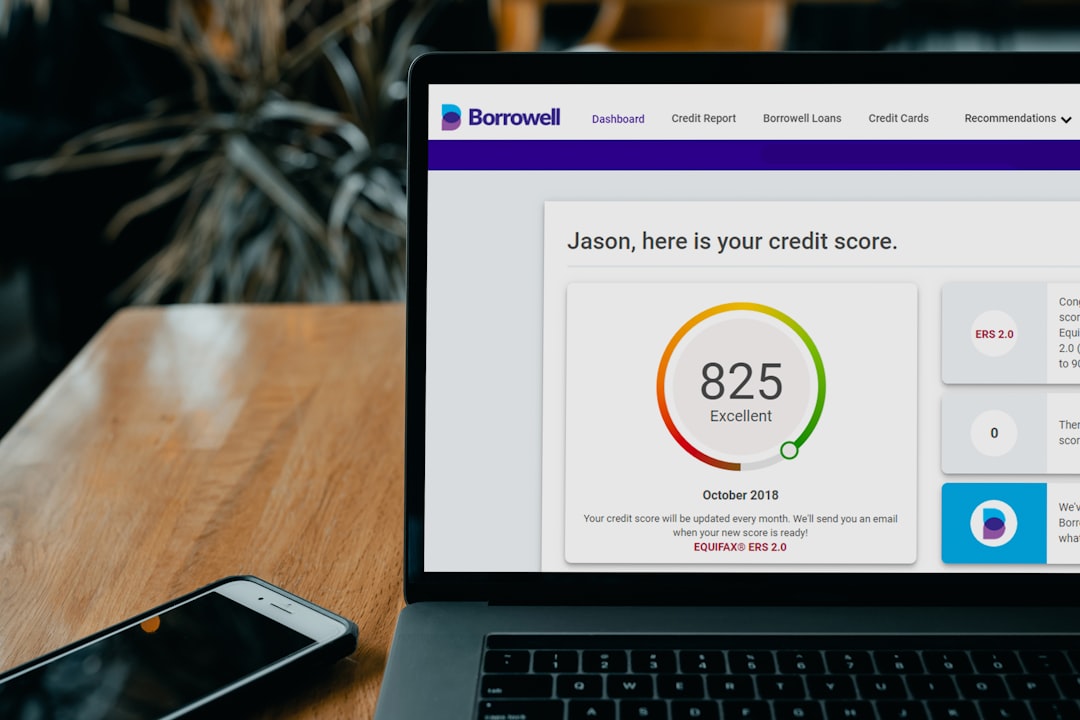 Person calculating credit card rewards and annual fees with calculator and multiple credit cards