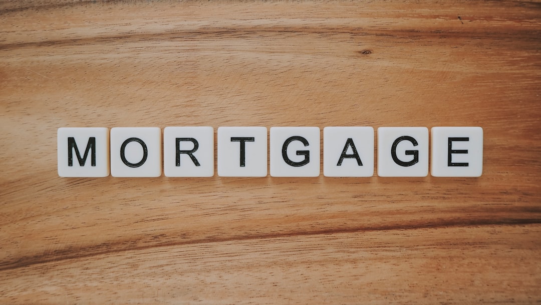 Calendar with mortgage application documents and debt consolidation paperwork showing timing considerations