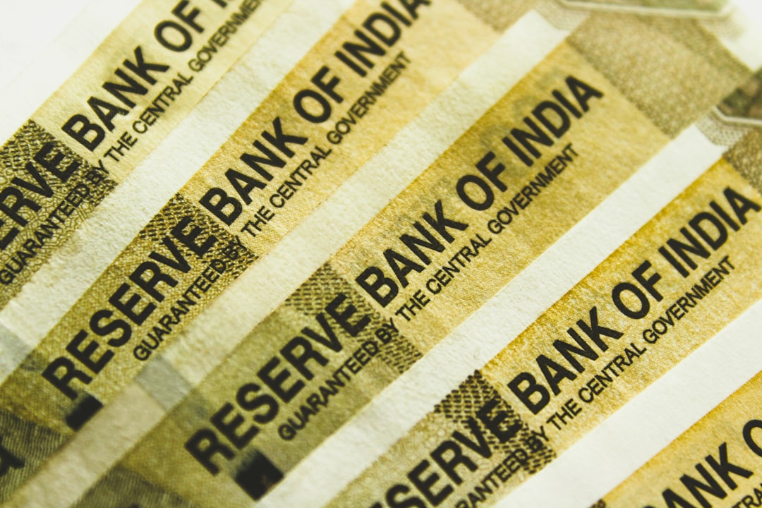 Calendar showing FBAR deadline with foreign currency and bank documents on desk