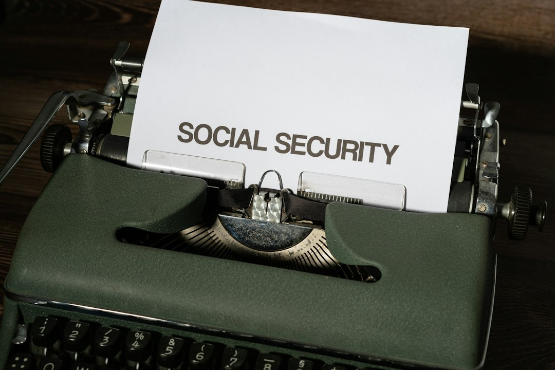 Social Security card with retirement planning documents and calculator on a desk